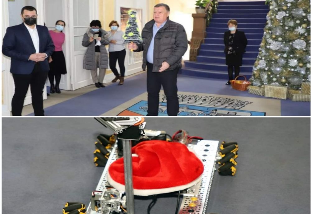 Colindăm, colindăm...cu robotul. O vizită inedită la Primăria Râmnicului